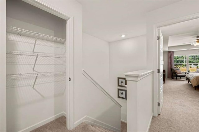 1315 Aura Ln, Lawrenceville, GA 30045 - corridor with light colored carpet and an upstairs landing