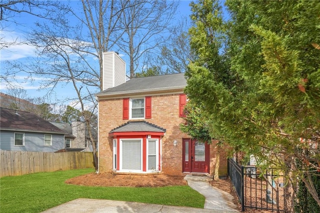 view of front of property with a front lawn