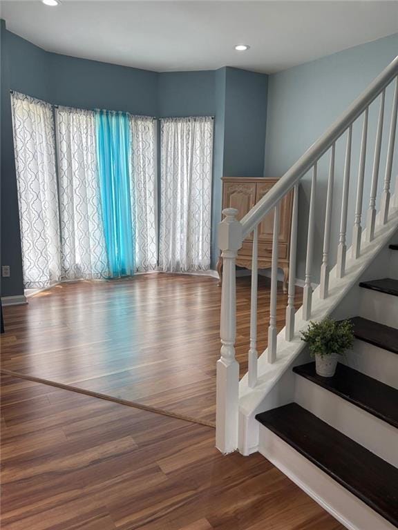 1951 Bergerac Ct SW, Marietta, GA 30008 - stairs featuring wood finished floors and recessed lighting