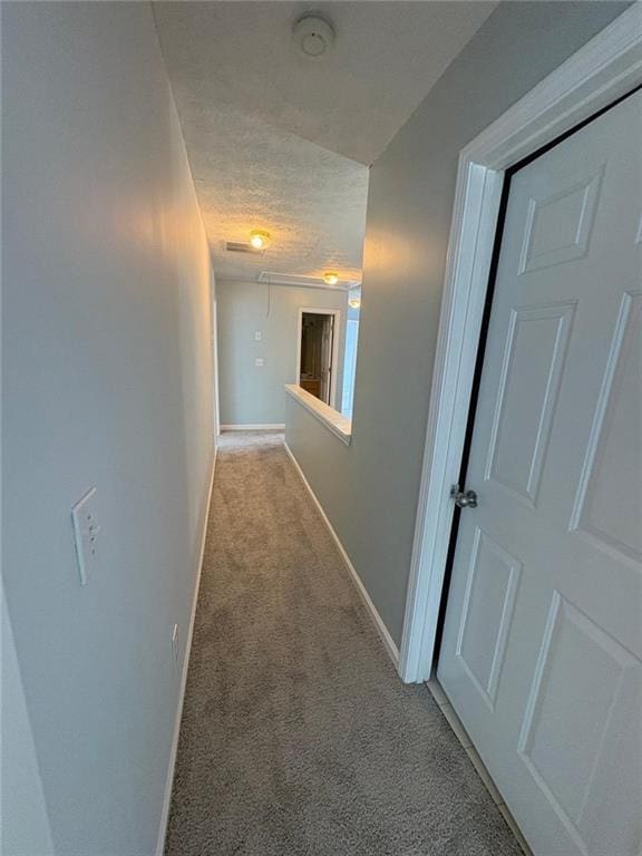 1951 Bergerac Ct SW, Marietta, GA 30008 - corridor with attic access, carpet, baseboards, and a textured ceiling