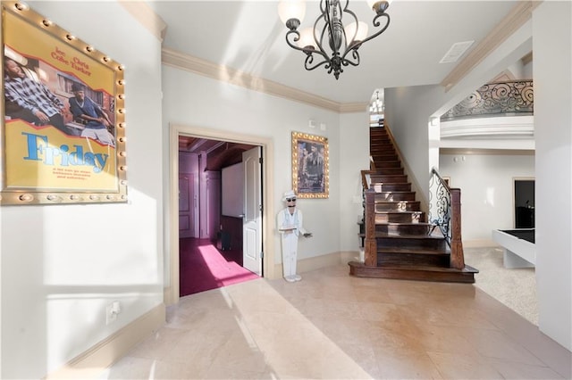 entryway featuring baseboards, visible vents, stairs, crown molding, and a chandelier