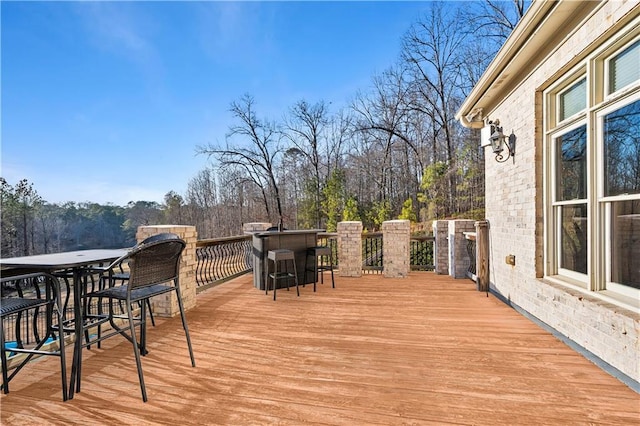 deck with outdoor dry bar