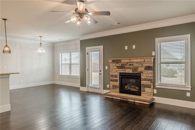 146 Blackgum Trce, Dallas, GA 30132 - unfurnished living room with dark wood-style floors, visible vents, baseboards, a ceiling fan, and a stone fireplace