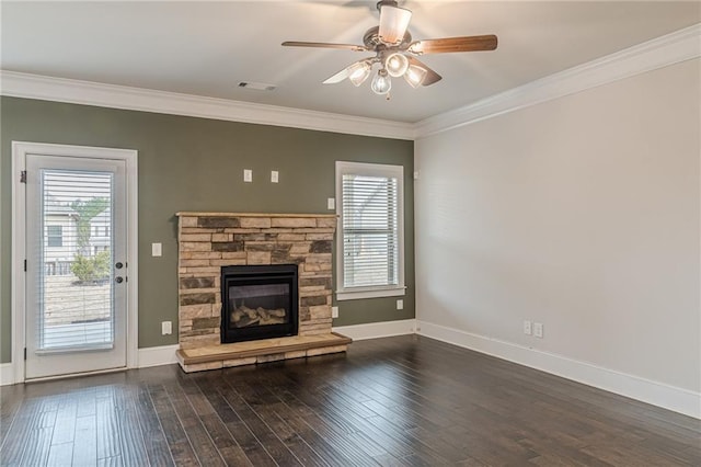 146 Blackgum Trce, Dallas, GA 30132 - unfurnished living room featuring baseboards, ceiling fan, crown molding, hardwood / wood-style floors, and a stone fireplace