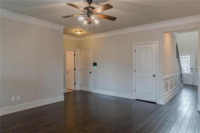 146 Blackgum Trce, Dallas, GA 30132 - spare room with ornamental molding, ceiling fan, baseboards, and dark wood-style flooring