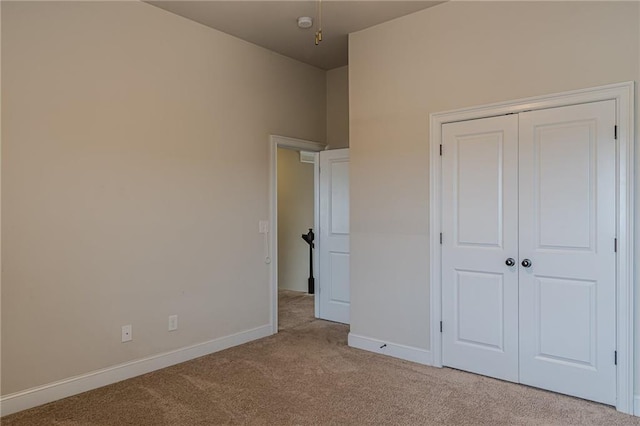 146 Blackgum Trce, Dallas, GA 30132 - unfurnished bedroom with carpet floors, a closet, and baseboards
