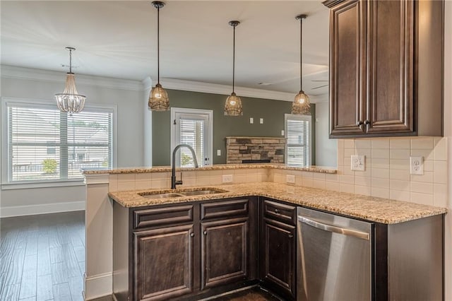 kitchen with sink, light stone counters, dark brown cabinets, stainless steel dishwasher, and pendant lighting