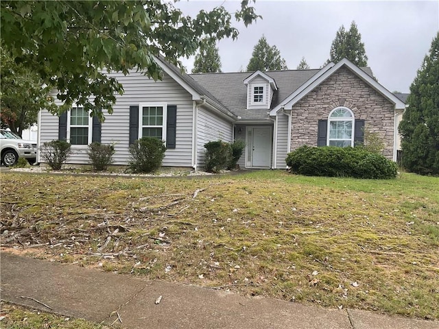 view of front of house with stone siding