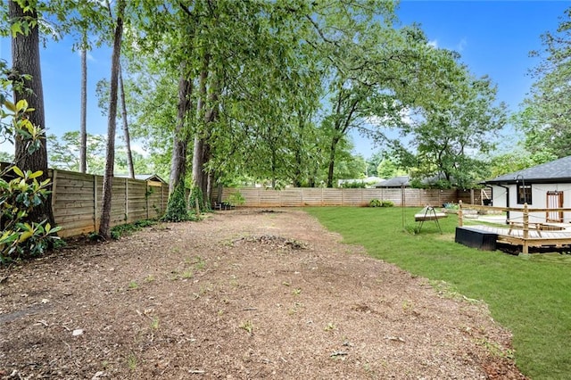 view of yard with a deck