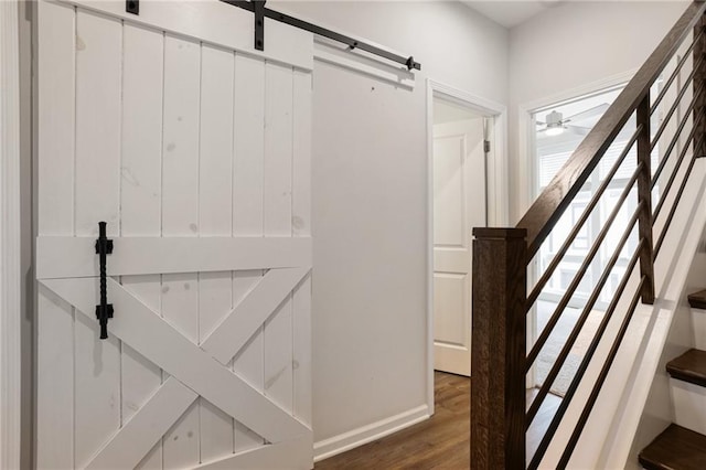 interior space with ceiling fan and hardwood / wood-style flooring