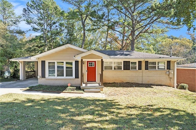 2434 Miriam Ln, Decatur, GA 30032 - ranch-style home featuring brick siding, a front lawn, driveway, and an attached carport