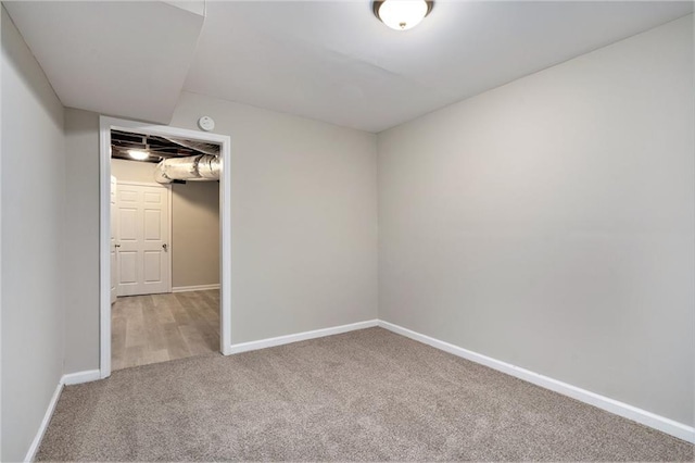 2434 Miriam Ln, Decatur, GA 30032 - spare room featuring baseboards and carpet