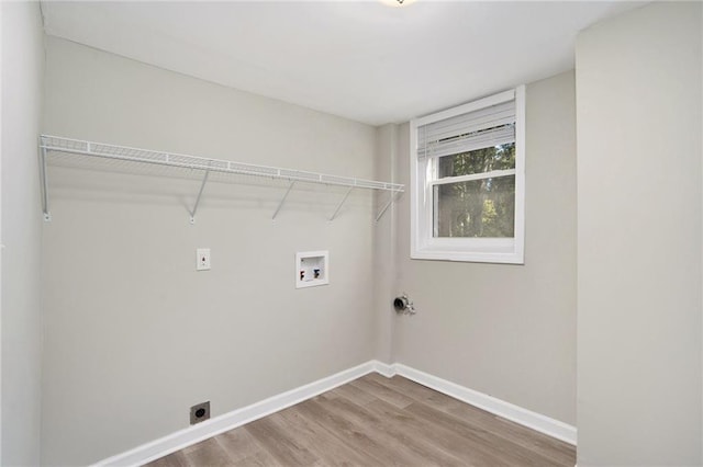2434 Miriam Ln, Decatur, GA 30032 - laundry area featuring laundry area, wood finished floors, baseboards, electric dryer hookup, and washer hookup
