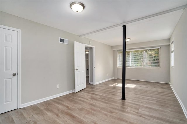 2434 Miriam Ln, Decatur, GA 30032 - unfurnished bedroom featuring visible vents, baseboards, and light wood-type flooring