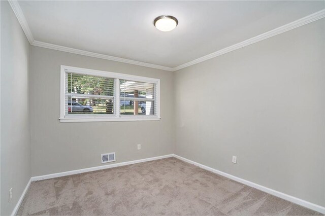 2434 Miriam Ln, Decatur, GA 30032 - spare room with visible vents, ornamental molding, and baseboards