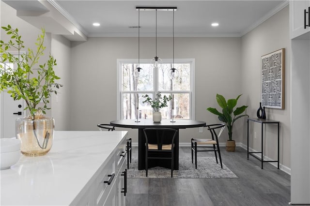 interior space featuring ornamental molding, recessed lighting, dark wood-type flooring, and baseboards