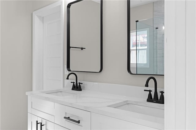 full bathroom featuring a sink and double vanity