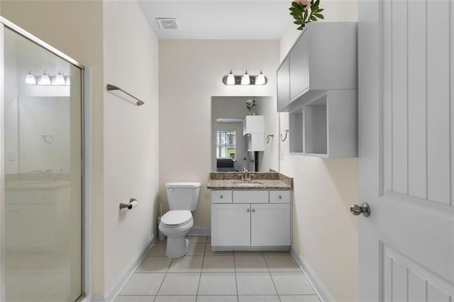 17 Twelve Oaks Dr SE, Cartersville, GA 30120 - bathroom with vanity, tile patterned floors, a stall shower, toilet, and baseboards