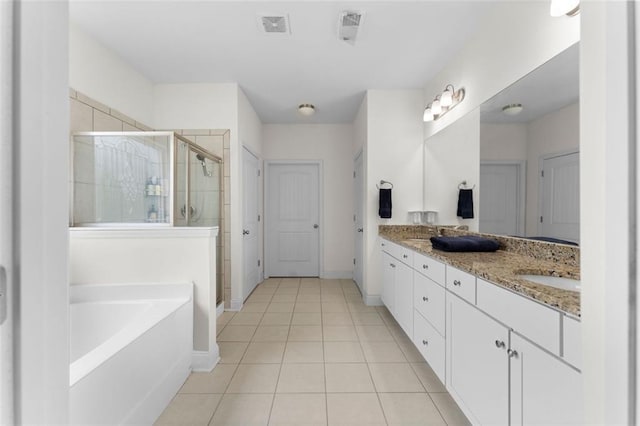 17 Twelve Oaks Dr SE, Cartersville, GA 30120 - full bath with a stall shower, double vanity, tile patterned flooring, a bath, and baseboards