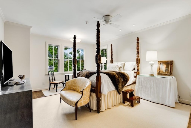 bedroom with wood-type flooring, ceiling fan, and crown molding