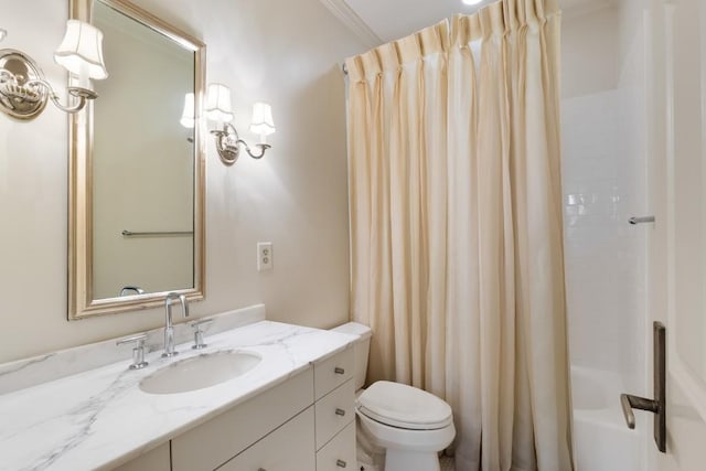 full bathroom with shower / bath combo, vanity, toilet, and crown molding