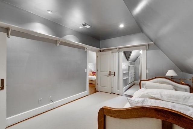 bedroom featuring vaulted ceiling