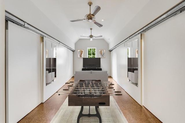 playroom with ceiling fan and vaulted ceiling