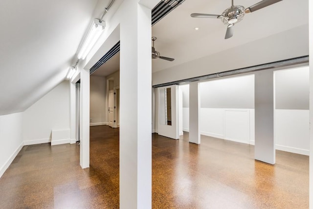 additional living space featuring vaulted ceiling and ceiling fan