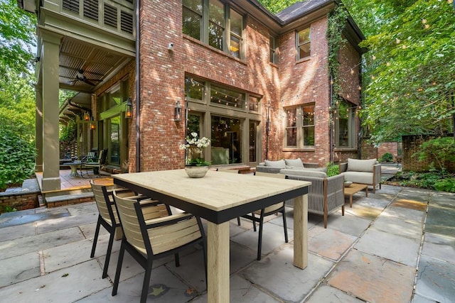 view of patio featuring ceiling fan and an outdoor hangout area