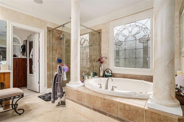 bathroom featuring decorative columns, tiled shower, tile patterned floors, a garden tub, and crown molding