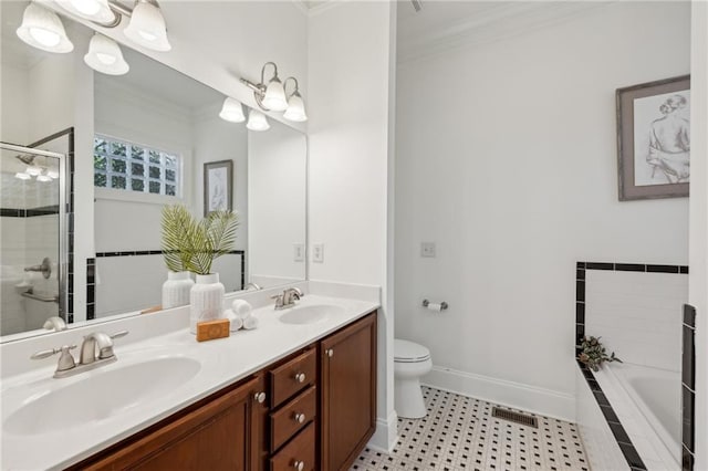 full bathroom featuring crown molding, shower with separate bathtub, vanity, and toilet