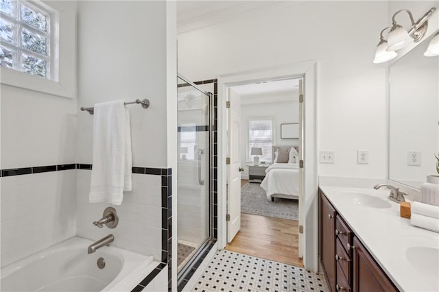 bathroom with vanity and plus walk in shower