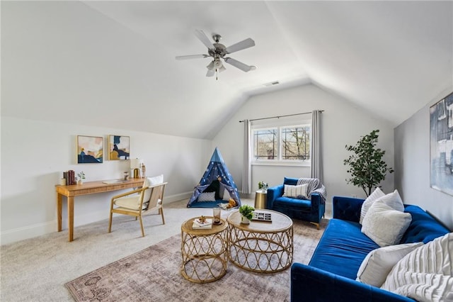 carpeted living room featuring vaulted ceiling and ceiling fan