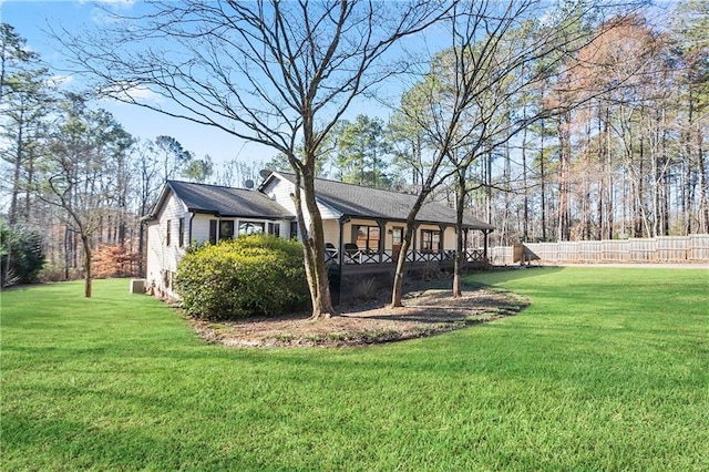 view of yard featuring fence