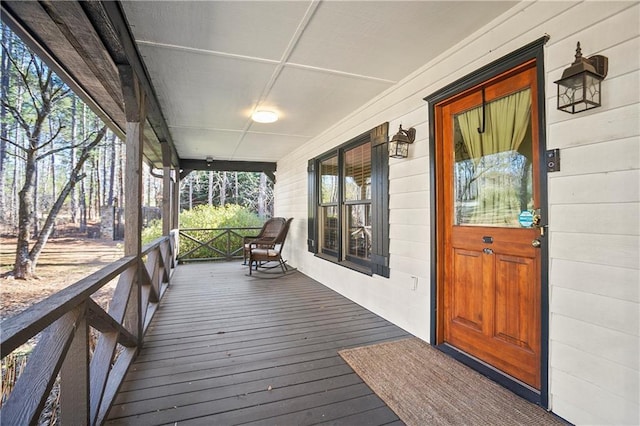 wooden deck featuring a porch