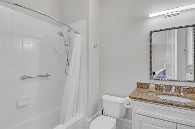 bathroom with toilet, shower / bath combo, and vanity