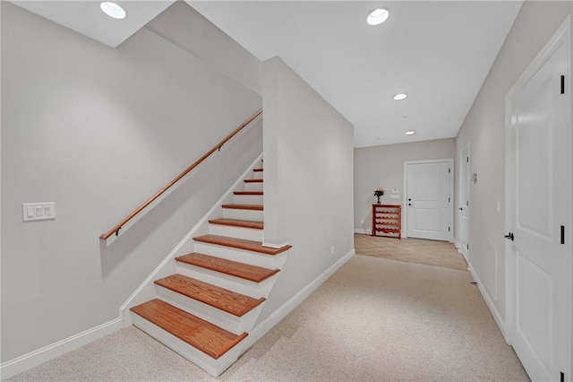 stairs featuring recessed lighting, baseboards, and carpet floors