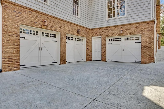 garage featuring driveway