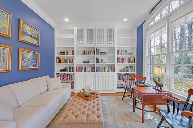 home office featuring crown molding, built in features, wood finished floors, and recessed lighting