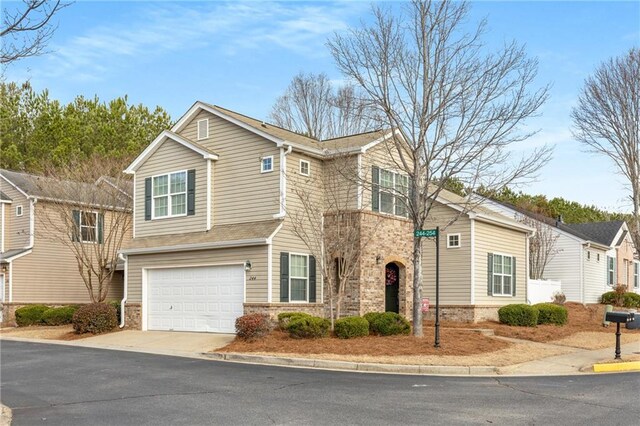 view of front of property with a garage