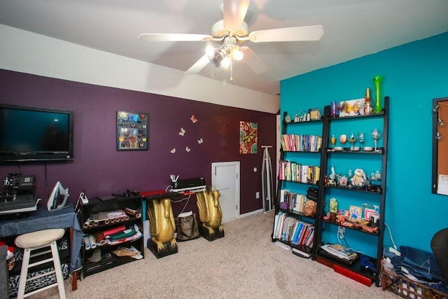 playroom with carpet floors and a ceiling fan