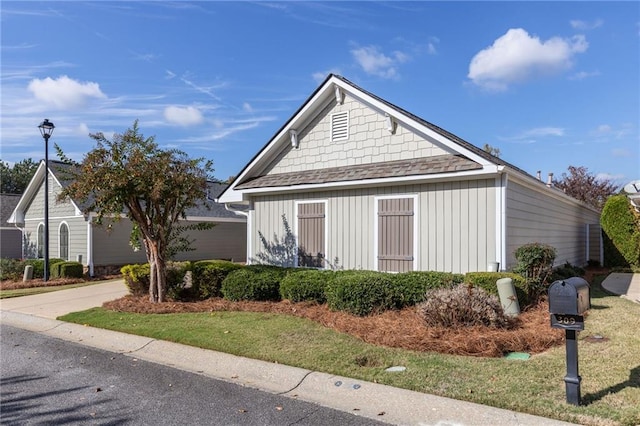 view of property exterior featuring a yard