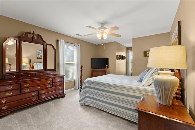 4955 Winding Rose Dr, Suwanee, GA 30024 - bedroom featuring carpet, ceiling fan, and baseboards