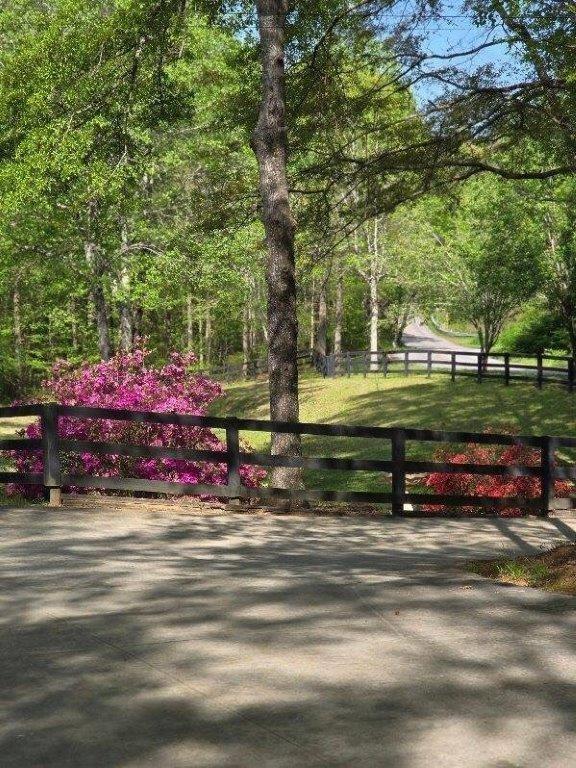 view of community with fence