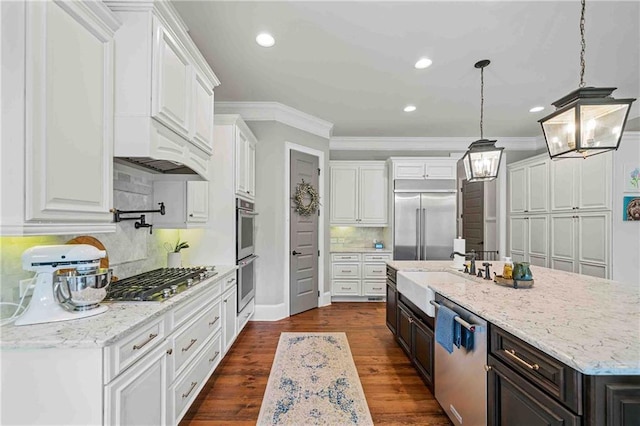 829 Christopher Rd, Sharpsburg, GA 30277 - kitchen with stainless steel appliances, white cabinets, a sink, crown molding, and backsplash