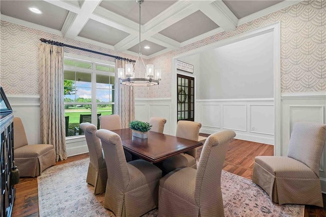 829 Christopher Rd, Sharpsburg, GA 30277 - dining room with wallpapered walls, a chandelier, wood finished floors, coffered ceiling, and beamed ceiling