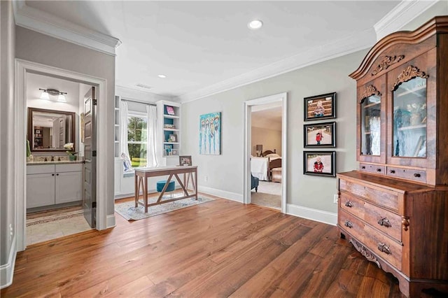 829 Christopher Rd, Sharpsburg, GA 30277 - corridor with crown molding, wood finished floors, baseboards, an office area, and recessed lighting