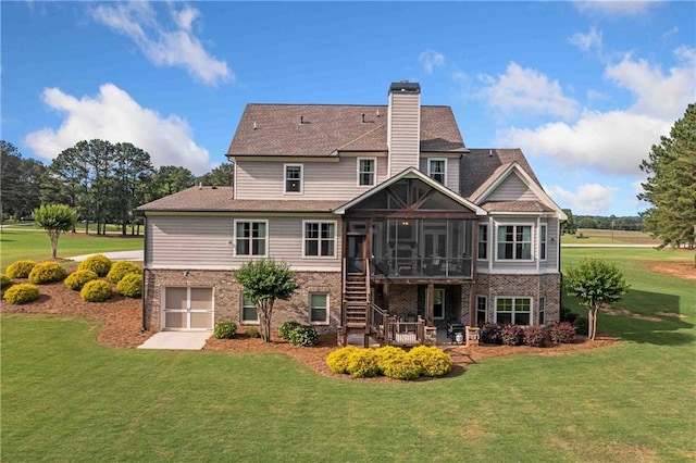829 Christopher Rd, Sharpsburg, GA 30277 - back of property featuring a sunroom, a chimney, a lawn, and brick siding