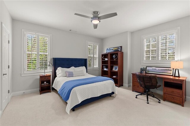 3749 Watkins Pl NE, Brookhaven, GA 30319 - carpeted bedroom with baseboards, ceiling fan, and an office area