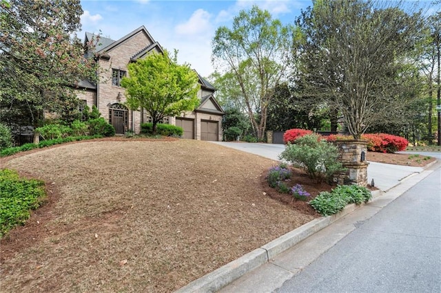 3749 Watkins Pl NE, Brookhaven, GA 30319 - view of front of home with driveway and a garage